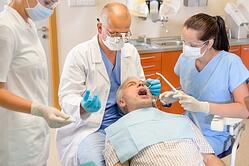 Dentist with Senior Patient