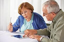 seniors looking over affordable care act