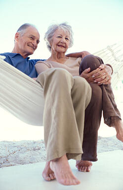 Senior couple relaxing in a hammock