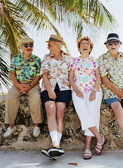 Group of laughing seniors on vacation together