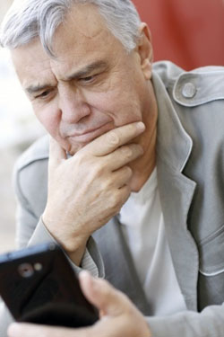 senior man with smartphone