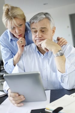 seniors reading about new technology