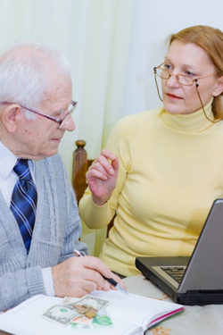 senior meeting with real estate agent