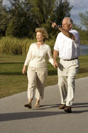 seniors-walking-in-park