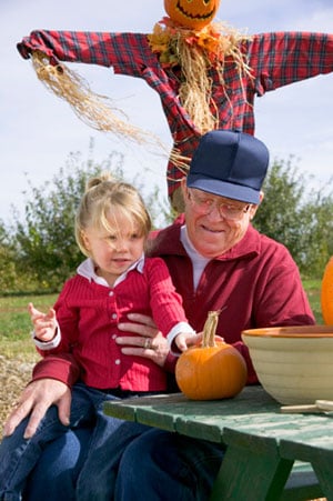 elderly-carving-pumpkins