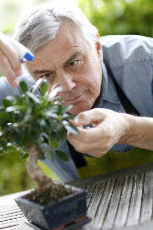 elderly-man-with-green-plant