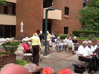 Senior living heads outdoors during the summer here at Marjorie Lee.