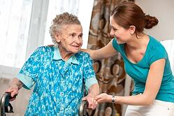 senior woman with caregiver at home