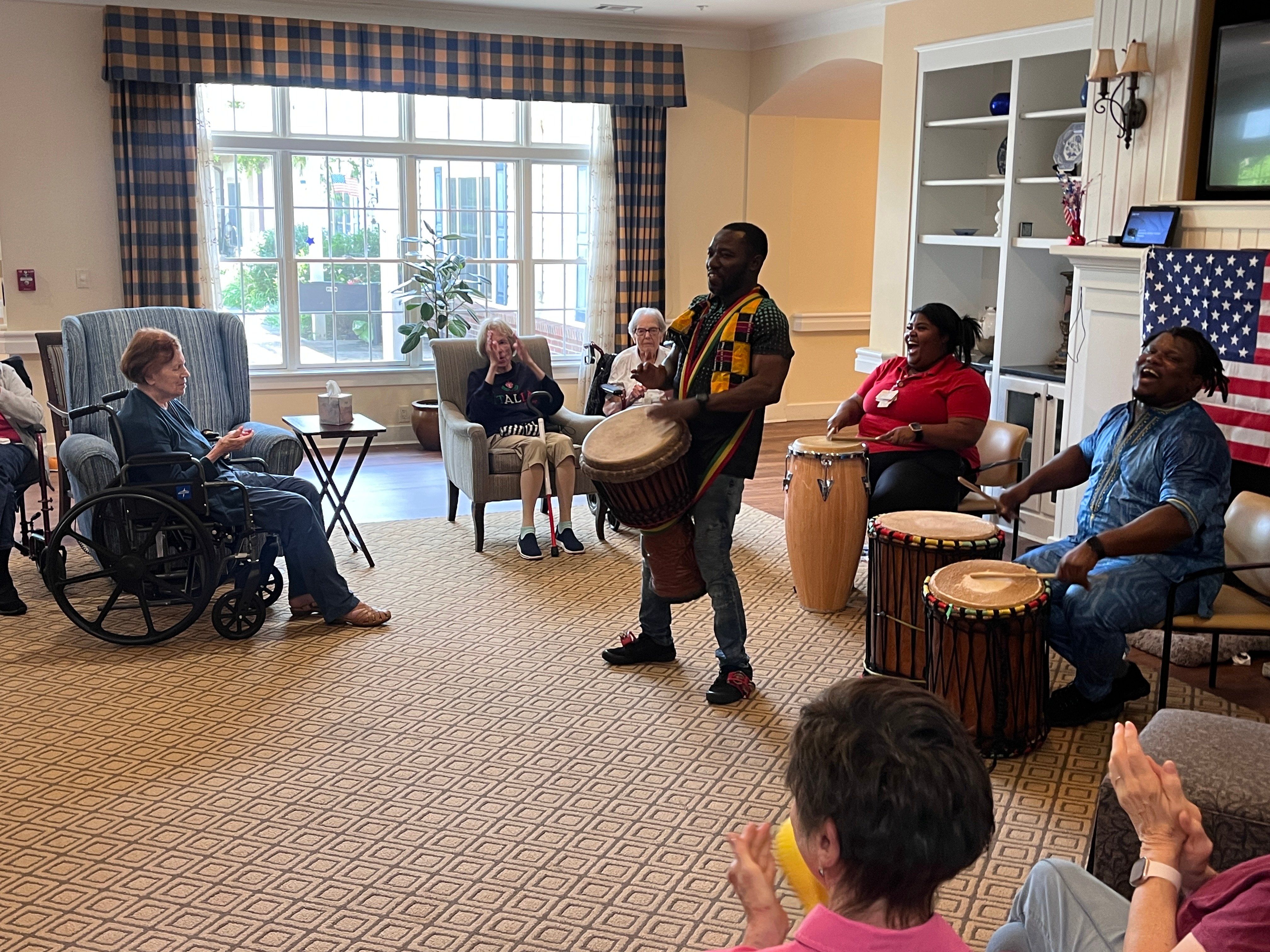 ERS residents watch an African Dance troupe performance to celebrate Juneteenth.