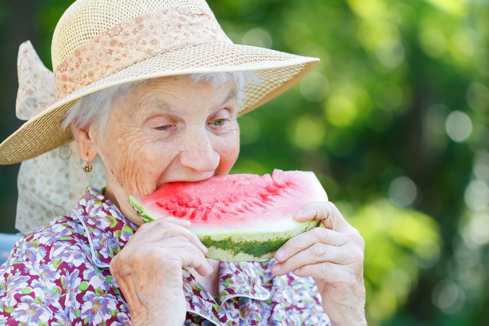 elderly-woman-eating-watermelon